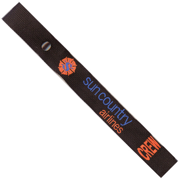 Sun Country Airlines - with BASE CODE options in Blue and Orange on a Black Crew Tag